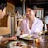 A couple enjoying dinner and beverages at Palo Trattoria on the Disney Adventure